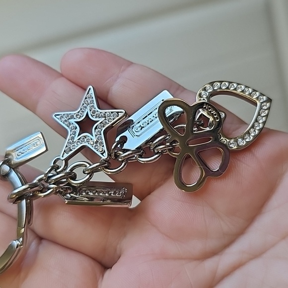 Coach NWOT Silver Keychain with Heart, Star, and Butterfly Charms - Picture 7 of 7
